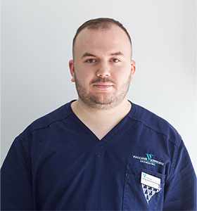 Dr. Besjan Karriqi